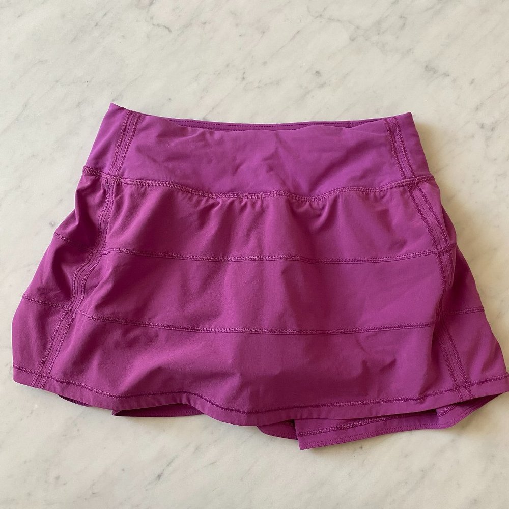 Lululemon Pace Rival Mid Rise Skirt. Vivid Plum, 12" inseam. Size 2